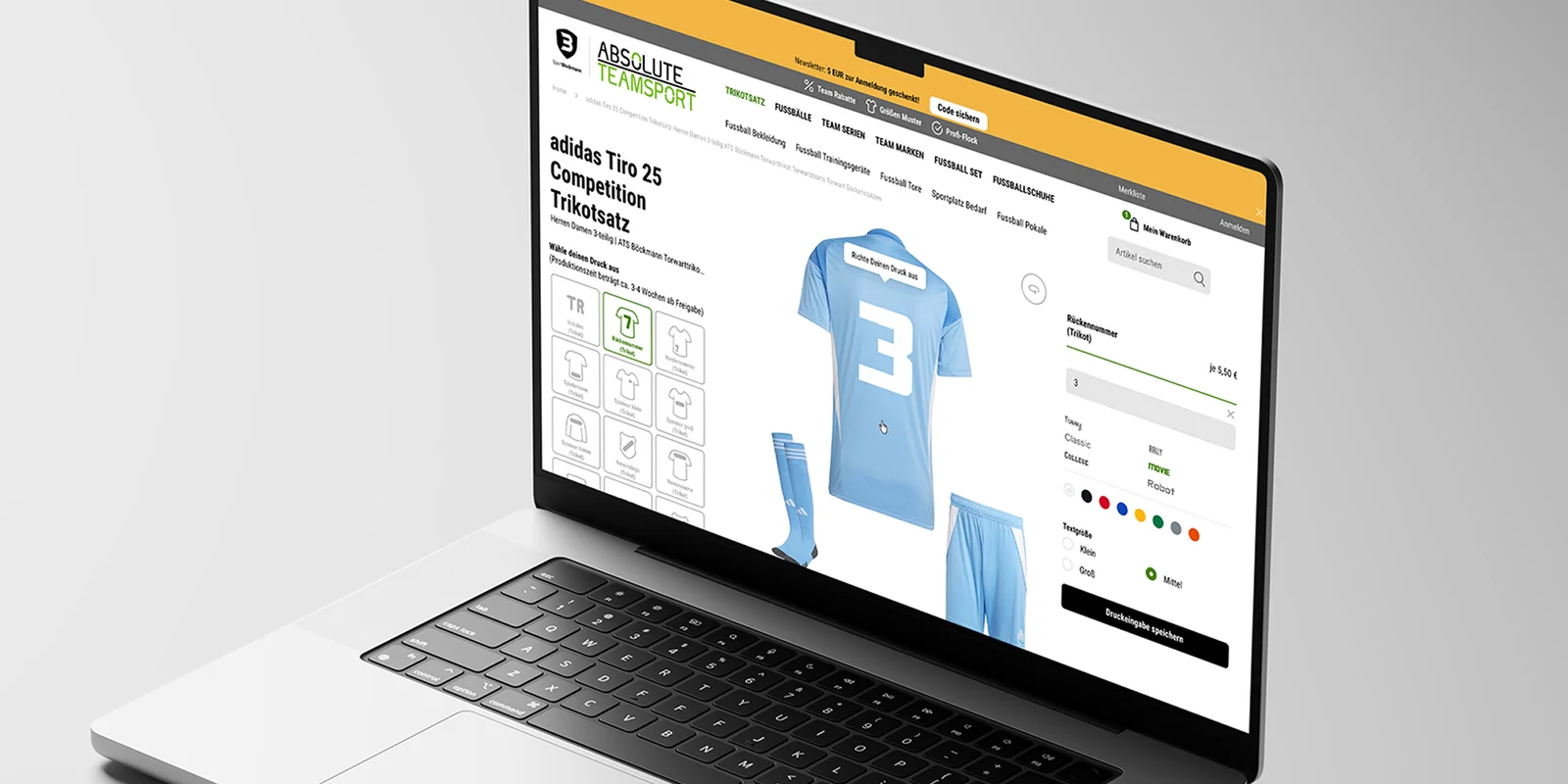 Laptop mit geöffneter Sport Böckmann-Website und Darstellung von Trikot-Druckmöglichkeiten